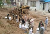 حضور بسیجیان پایگاه شرکت تعمیرات نیروگاه های برق آبی در مناطق سیل زده  خوزستان